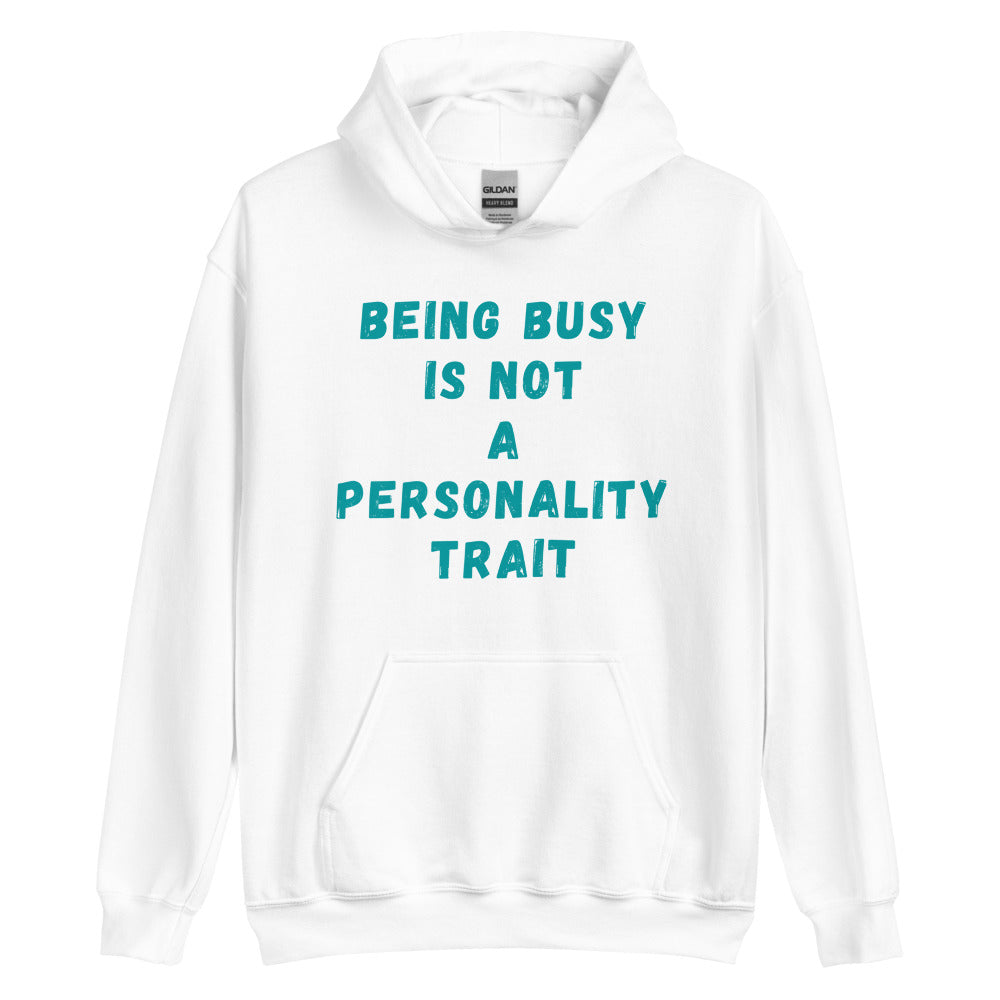 This is a funny hoodie sweatshirt. It is white and has "Being busy is not a personality trait" written across the front in aqua colored writing.